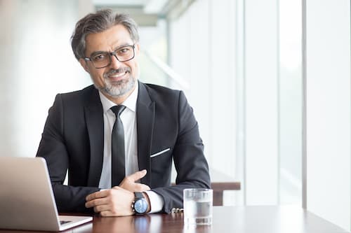 cheerful-businessman-eyeglasses-office-2