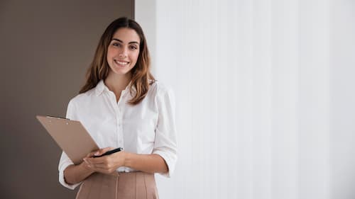 front-view-elegant-businesswoman-holding-clipboard-with-copy-space-2